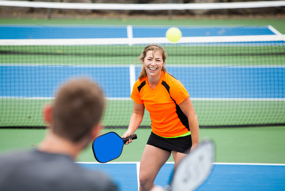 Young lady playing pickleball